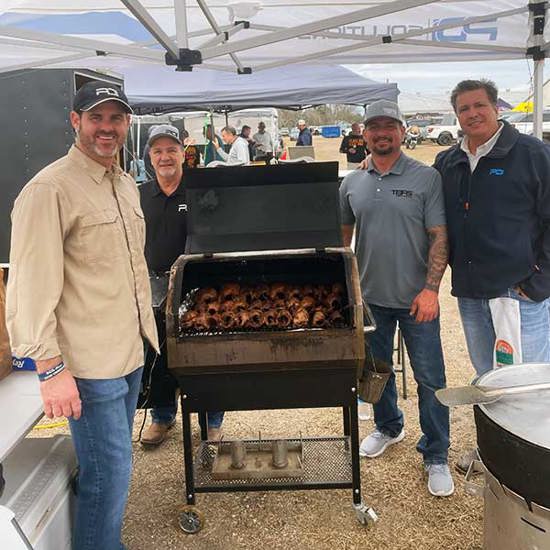 Energy inspection services - Team in Tent with BBQ Pit